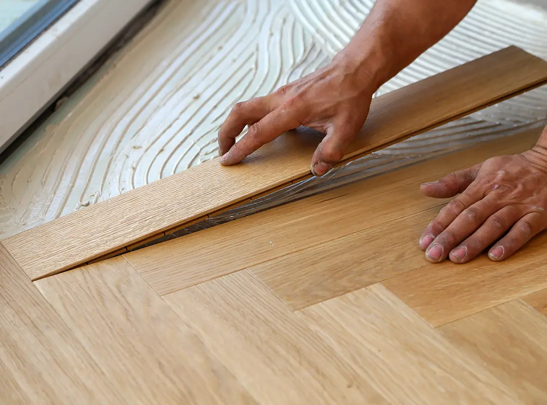 Pose de parquet sur colle